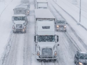 Read more about the article Heavy Towing in the Snow: How We Tow During the Winter Months